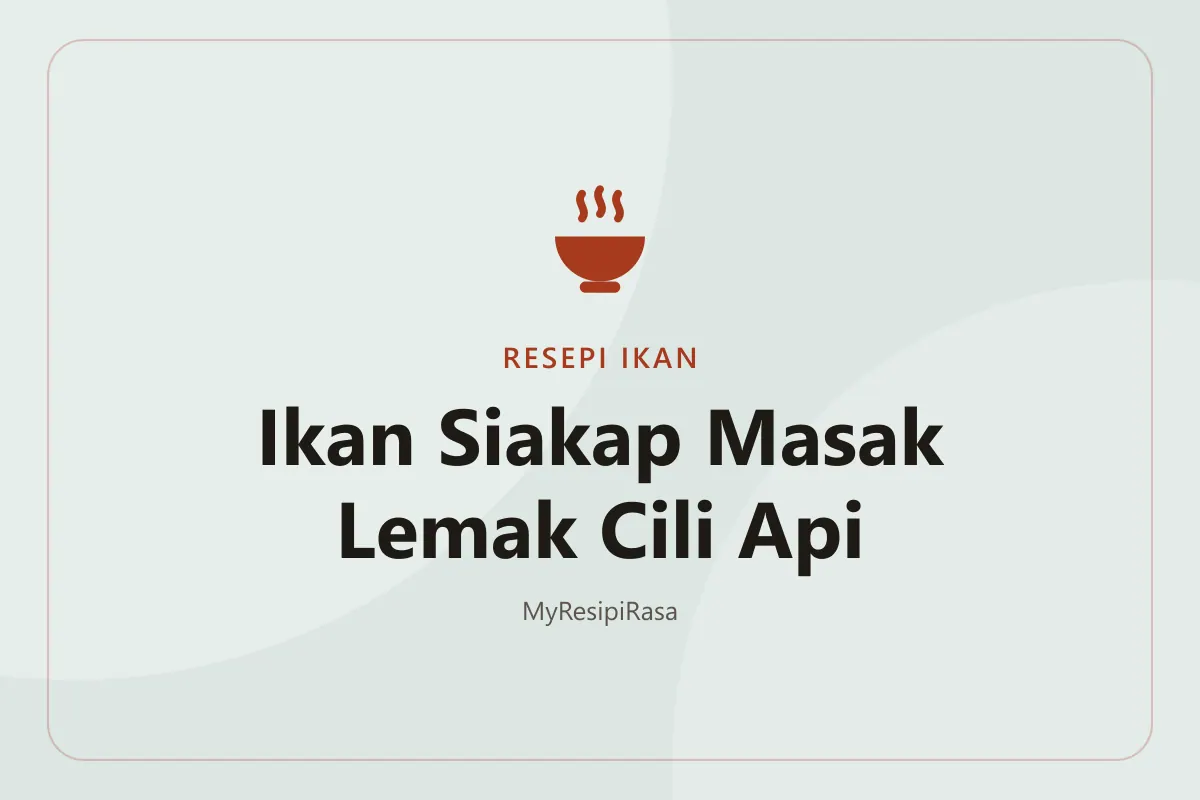 Ikan siakap masak lemak cili api berkuah santan kuning pekat dengan cili padi di dalam periuk