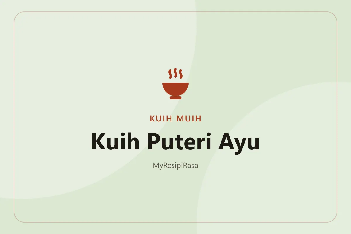 Kuih puteri ayu pandan berbentuk bunga dengan dasar kelapa parut putih di atas pinggan